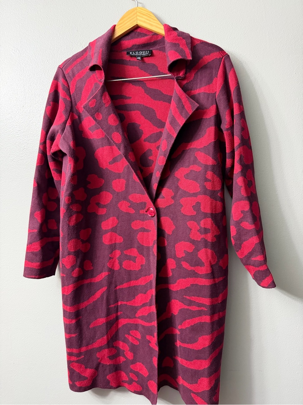 Eloquii sweater coat featuring a bold magenta and plum animal print 14/16